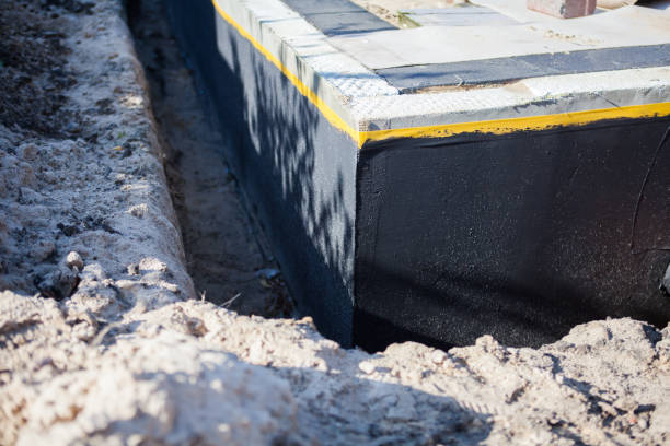 Professional Waterproofing technician working in Park Ridge, IL